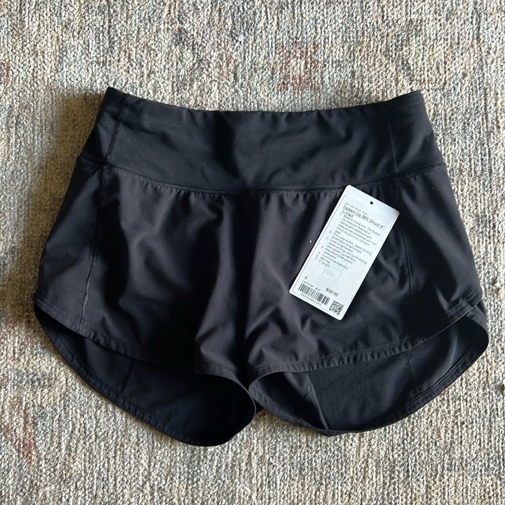 Lululemon speed up shorts mid rise 4 inch inseam black size 4